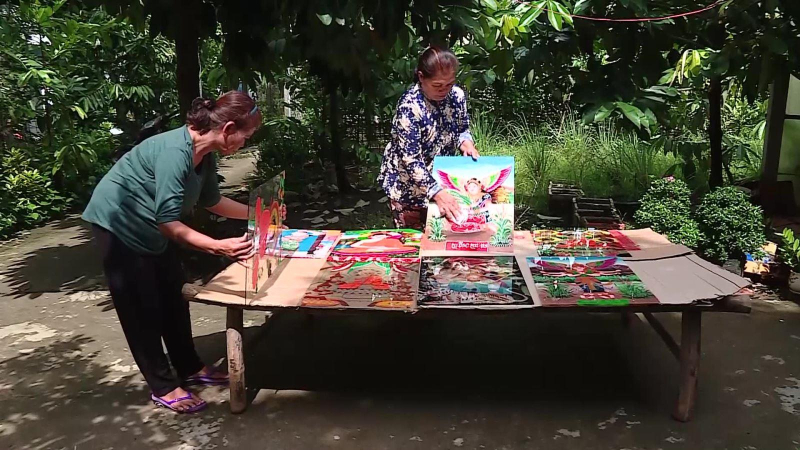 Phú Tân mai một nghề vẽ tranh trên kính