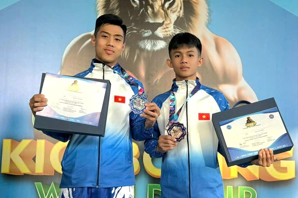 Hai vận động viên Nguyễn Trung Dũng và Võ Minh Triết xuất sắc giành 2 tấm Huy chương