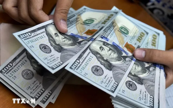 Đồng USD. Ảnh: AFP/TTXVN