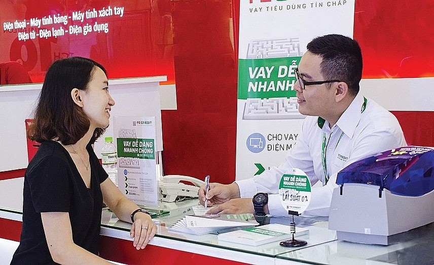 Ngân hàng Nhà nước đề xuất nâng trần khoản vay nhỏ gấp 4 lần, gỡ hạn mức cho vay trực tuyến. Ảnh tư liệu.