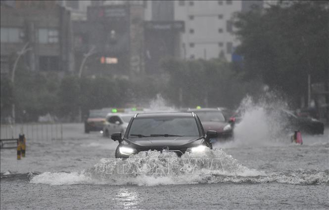 Khu vực bị ngập lụt sau những trận mưa lớn do ảnh hưởng của bão Wipha tại Hải Nam, Trung Quốc. Ảnh minh họa: THX/TTXVN