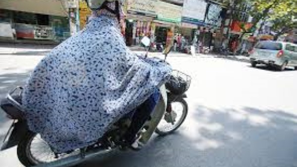 An to&agrave;n giao th&ocirc;ng khi mặc &aacute;o chống nắng