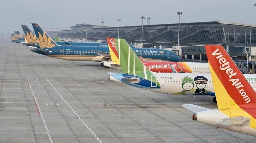 Máy bay của các hãng hàng không Việt Nam tại Sân bay Quốc tế Nội Bài. Ảnh: Vietnam+