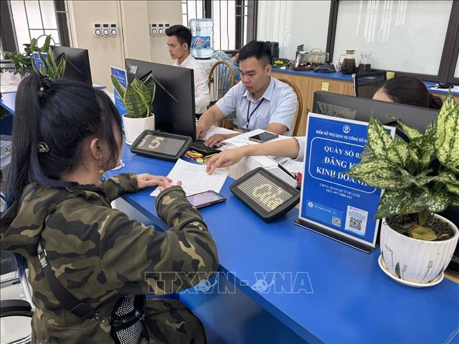 Không chỉ tinh gọn bộ máy, mô hình chính quyền địa phương hai cấp đang tạo những chuyển biến tích cực. Ảnh: TTXVN